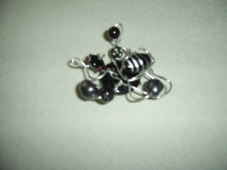 Broche preto